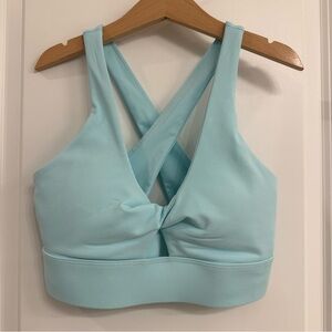 Fabletics Oasis Twist Medium Impact Cross-Back Women’s Sports Bra in Aqua XXS